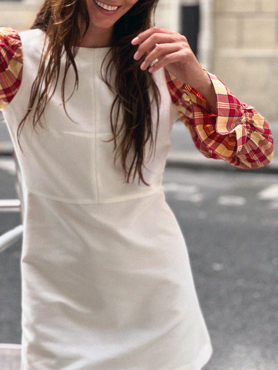 Ziggy • The twisted A-line dress with puff sleeves